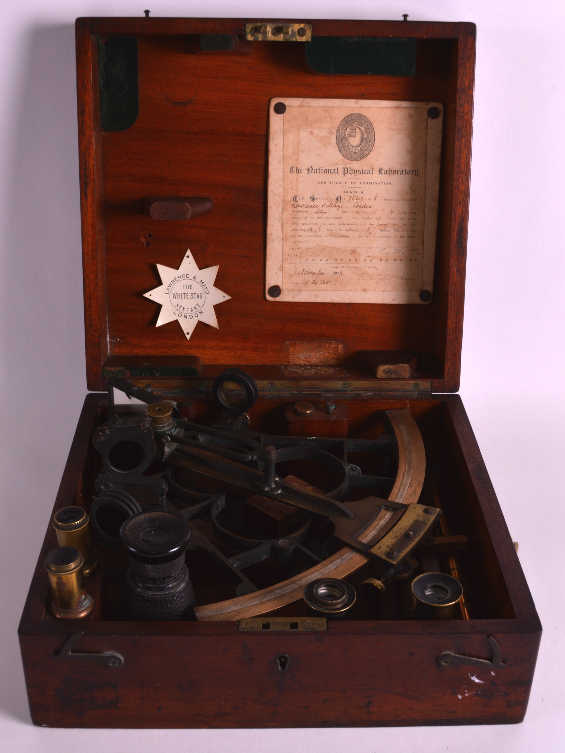 AN EARLY 20TH CENTURY MAHOGANY 'WHITE STAR' SEXTANT by Lawrence and Mayo of London. 11Ins wide.