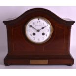 AN EDWARDIAN MAHOGANY MANTEL CLOCK by Walker and Hall ltd. 12Ins wide.