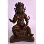 A CHINESE GILT PAINTED BRONZE MODEL OF A GUARDIAN modelled upon a shaped base. 7.25ins high.