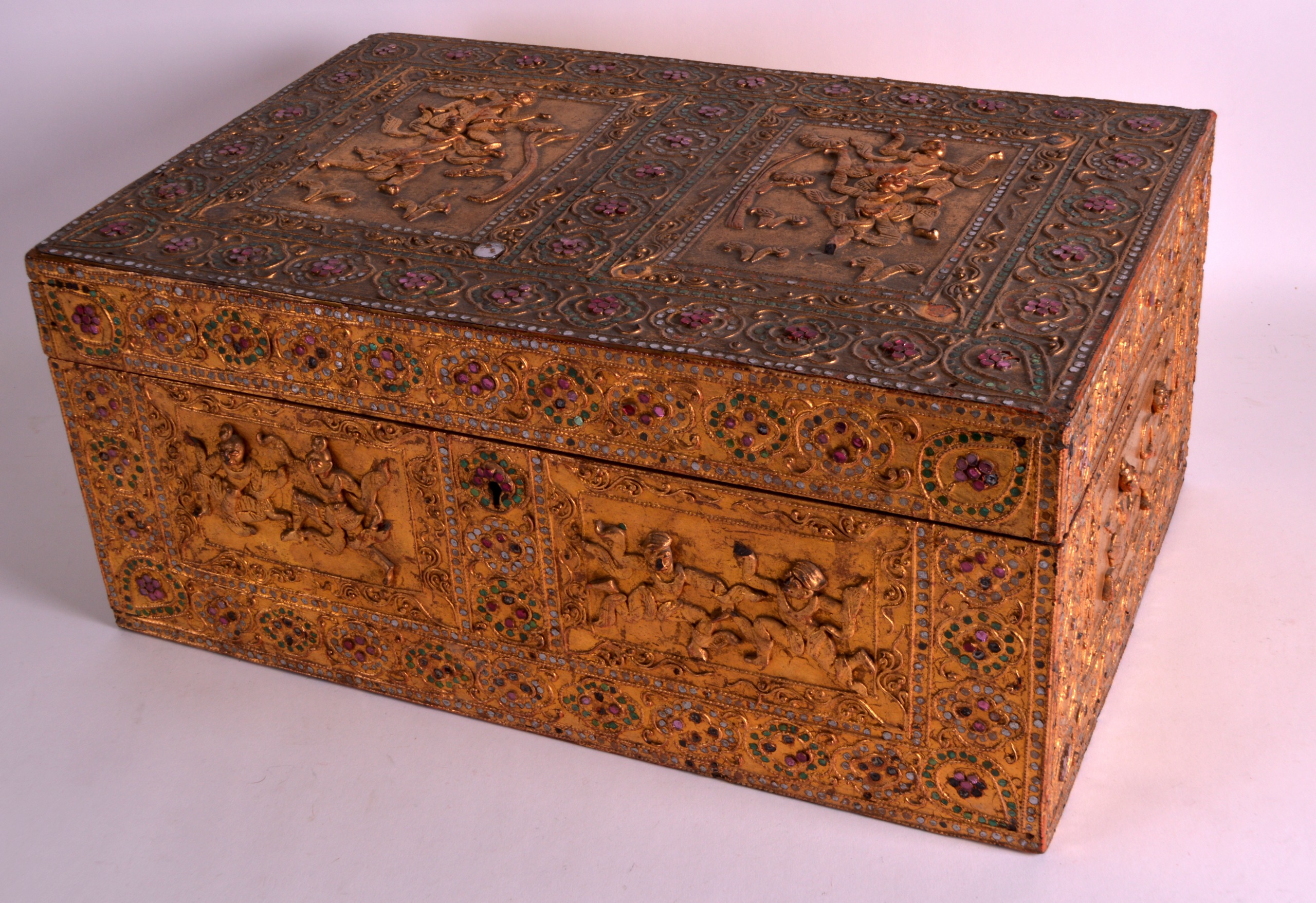 A GOOD 19TH CENTURY SOUTH EAST ASIAN JEWELLED RECTANGULAR CASKET decorated with figures and floral