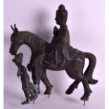 A GOOD CHINESE QING DYNASTY BRONZE FIGURE OF A MALE modelled upon a horse with an attendant by his