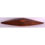AN ABORIGINAL CARVED WOOD PARRYING SHIELD carved all over with snakes, kangaroos etc. 1ft 11ins