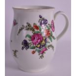 AN 18TH CENTURY WORCESTER BELL SHAPED MUG painted with floral sprays. 4.75ins high.