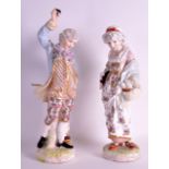 A PAIR OF LATE 19TH CENTURY GERMAN PORCELAIN FIGURES OF YOUNG BOY AND FEMALE modelled in foliate