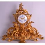 A GOOD MID 19TH CENTURY FRENCH ORMOLU MANTEL CLOCK of scrolling rococo form, modelled as two