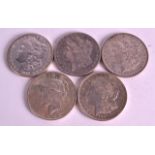 A USA MORGAN DOLLAR 1882 AND 1897 together with three others. (5)