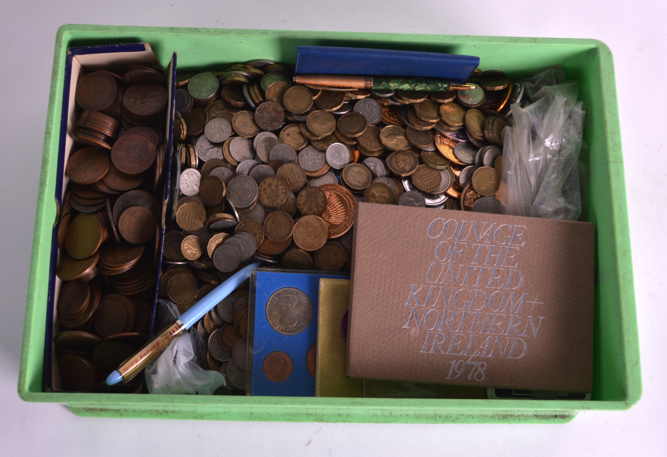 A LARGE GREEN BOX containing British coins. (qty)