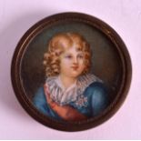 AN EARLY 20TH CENTURY PAINTED PORTRAIT IVORY MINIATURE depicting a male with curly hair. 1.5ins