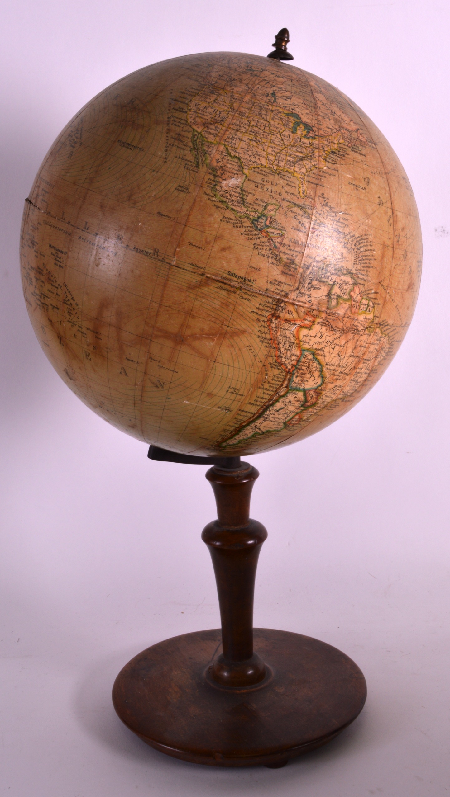 A VINTAGE COLUMBUS ERDGLOBUS REVOLVING DESK GLOBE upon a turned wood base. 1Ft 6ins high.