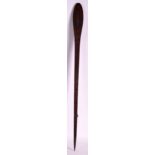 A SMALL ABORIGINAL CARVED WOOD SPEAR AND PADDLE possibly for a child, inscribed all over with