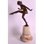 A LOVELY ART DECO COLD PAINTED BRONZE FIGURE OF A FEMALE DANCER modelled with one leg