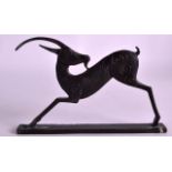 A STYLISH BRONZE MODEL OF A SLENDER DEER incised with motifs. 6.25ins wide.