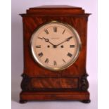 A WILLIAM IV CARVED MAHOGANY DOUBLE FUSEE MANTEL CLOCK by Griffith, contained within an acanthus