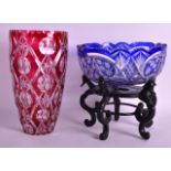 AN EARLY 20TH CENTURY BOHEMIAN BLUE FLASH GLASS BOWL together with a cranberry flash vase. Bowl 9ins