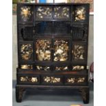 A SUPERB LATE 19TH CENTURY JAPANESE CARVED HARDWOOD SHIBAYAMA CABINET wonderfully executed with