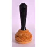 A 19TH CENTURY CARVED AND STAINED GAVEL with ebonised handle. 6.75ins high.