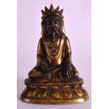 A FINE 19TH CENTURY SINO TIBETAN BRONZE FIGURE OF A SCHOLAR unusually modelled with a beard,