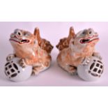 A PAIR OF 19TH CENTURY JAPANESE MEIJI PERIOD KUTANI FIGURES depicting buddhistic dogs looking