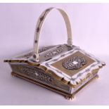 A FINE 19TH CENTURY ANGLO INDIAN CARVED IVORY AND HORN TWO DOOR BASKET with floral engraved panels