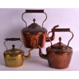 A VICTORIAN COPPER KETTLE together with two other antique kettles. Largest 12ins high. (3)
