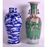 A 19TH CENTURY CHINESE BLUE AND WHITE BALUSTER DRAGON VASE together with a Canton famille rose vase,