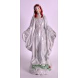 A STAFFORDSHIRE FIGURE OF THE VIRGIN MARY modelled standing before a snake. 10.75ins high.