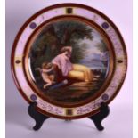 A LARGE 19TH CENTURY VIENNA PORCELAIN PLATE painted with a classical scene of a female with