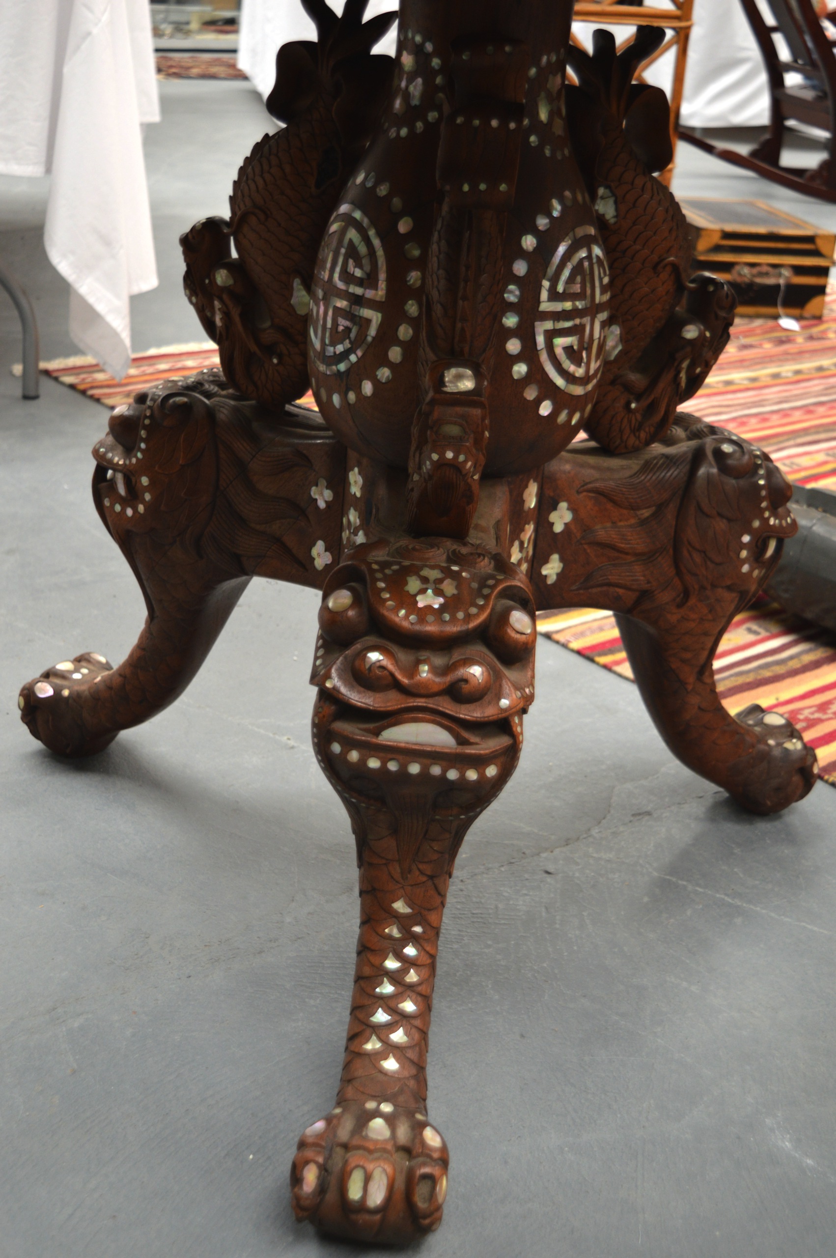 A GOOD 19TH CENTURY CHINESE CARVED HARDWOOD AND MOTHER OF PEARL CENTRE TABLE supported on boldly - Image 3 of 3