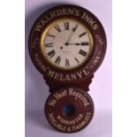 A GOOD WALKDENS INKS LACQUERED BAIRD CLOCK CO ADVERTISING CLOCK with cream dial decorated with black