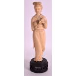 A LATE 19TH CENTURY CHINESE CARVED IVORY MODEL OF A FEMALE modelled holding a floral sprig. Ivory