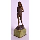 Joe Descomps (1869-1950) A 1920s French bronze figure of a standing bronze nude female, modelled