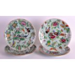 A SET OF FOUR MID 19TH CENTURY CHINESE CANTON CELADON PLATES painted with birds amongst foliage. 7.