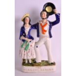 A STAFFORDSHIRE FIGURE OF THE SAILORS RETURN modelled upon a named oval base. 12.5ins high.