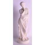A 19TH CENTURY PARIAN WARE FIGURE OF A CLASSICAL FEMALE modelled in robes upon a circular base. 14.