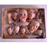 A COLLECTION OF TEN ANTIQUE PORCELAIN DOLLS HEADS of various sizes. (10)