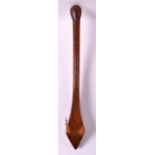 AN ABORIGINAL CARVED WOOD CLUB with bionical head. 1Ft 8ins long.