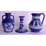 A 19TH CENTURY WEDGWOOD JASPERWARE CANDLESTICK together with a jug and a Wedgwood Portland vase. (