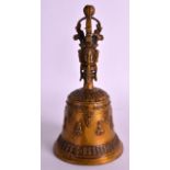 A TIBETAN BRONZE HAND BELL 20th Century, with figural terminal. 7.25ins high.