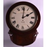 AN ENGLISH CARVED MAHOGANY FUSEE WALL CLOCK by R Best of York. 1Ft 3ins wide.