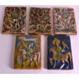 A GROUP OF FIVE EARLY 20TH CENTURY PERSIAN TILES of various designs. 8.5ins x 6ins. (5)