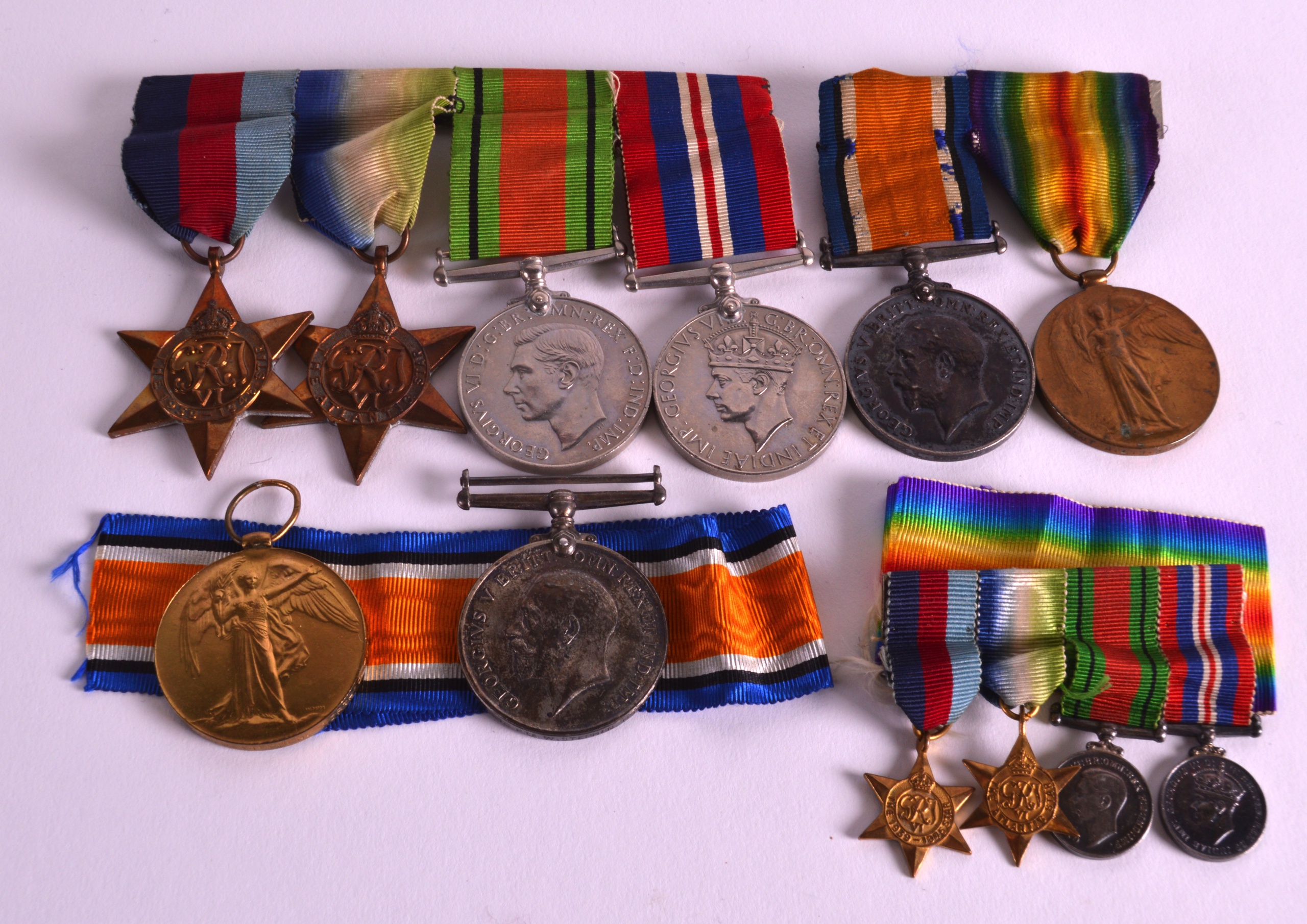 A COLLECTION OF WWI MEDALS presented to both Lieut L S Harris & Pte W Stephen North, including