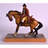 AN UNUSUAL 1930S AUSTRIAN COLD PAINTED TABLE LIGHTER in the form of a masked male upon a horse. 9.