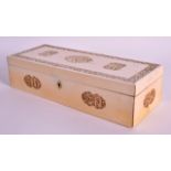 A MID 19TH CENTURY CHINESE CARVED CANTON IVORY RECTANGULAR BOX formed with three landscape panels,