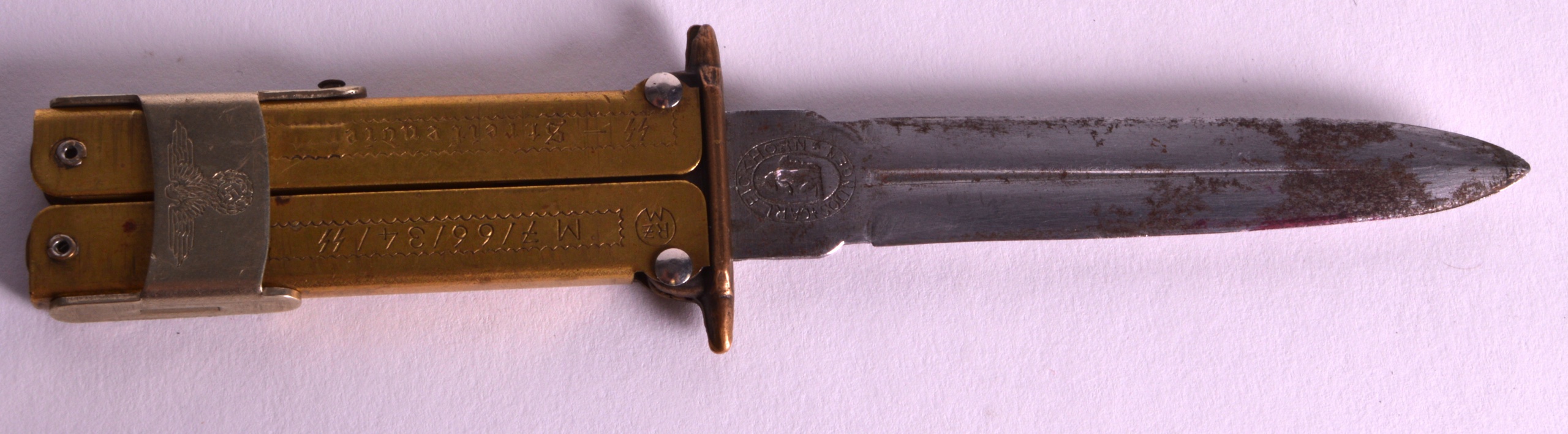 A VERY RARE SIGNED GERMAN NAZI DAGGER of unusual form, with engraved motifs and numerals. 5Ins x