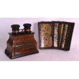 A LATE VICTORIAN/EDWARDIAN STEREO VIEWER together with unusual scenes from across Europe. (qty)