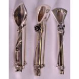 A GROUP OF THREE SILVER POSY HOLDER BROOCHES. (3)