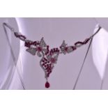 A SILVER AND RUBY BUTTERFLY NECKLACE.