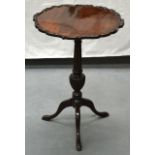 A MAHOGANY TRIPOD OCCASIONAL TABLE. 2Ft 5ins high.