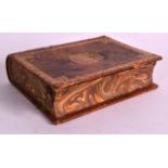 A SMALL EDWARDIAN LEATHER STORAGE BOX in the form of a book, with marbled pages. 6Ins wide.