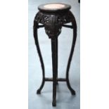 A LATE 19TH CENTURY CHINESE CARVED HARDWOOD STAND with marble inset top and bamboo carved